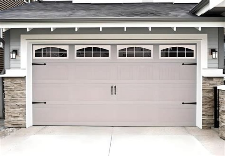 Can I use WD-40 on my garage door tracks?