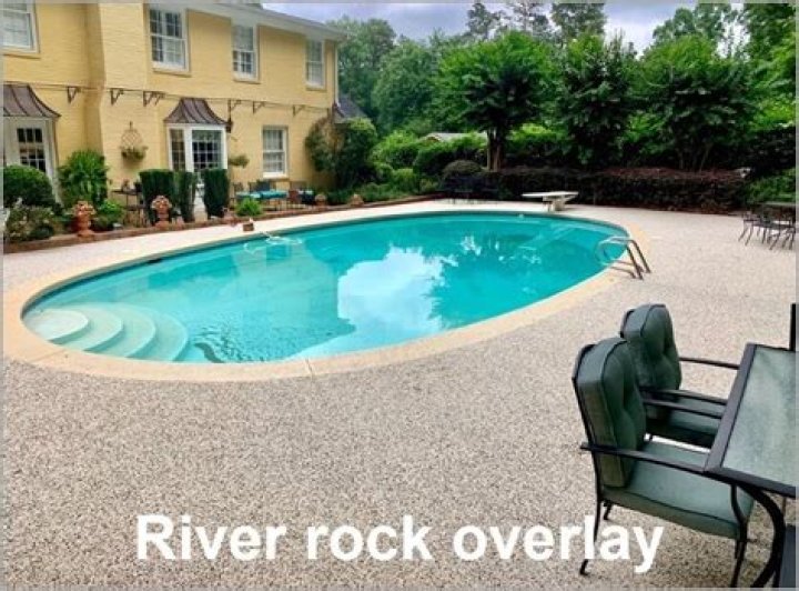 How do you cover a river rock pool deck?